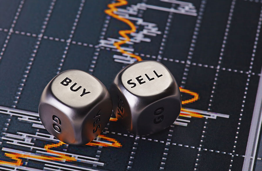 buy and sell dice with stock charts in the background