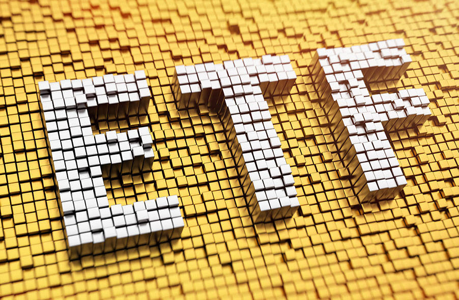 gold blocks in the background and white blocks arranged to form etf word