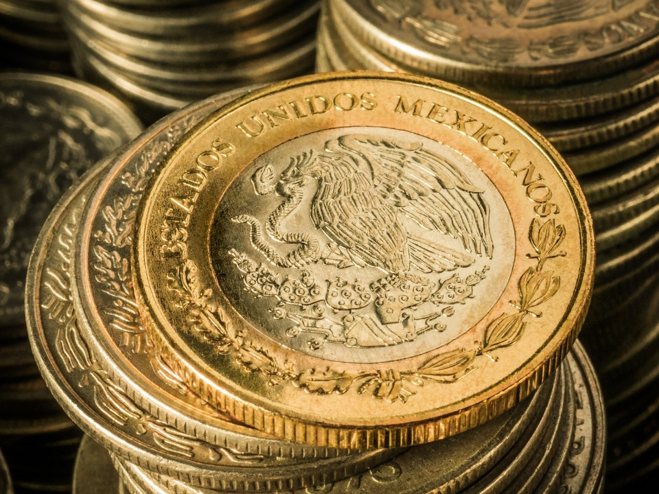 stacked mexican gold coins