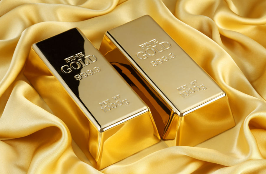 1 kilogram fine gold bar on golden silk
