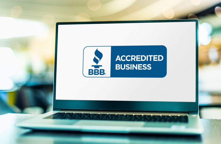 laptop showing better business bureau logo
