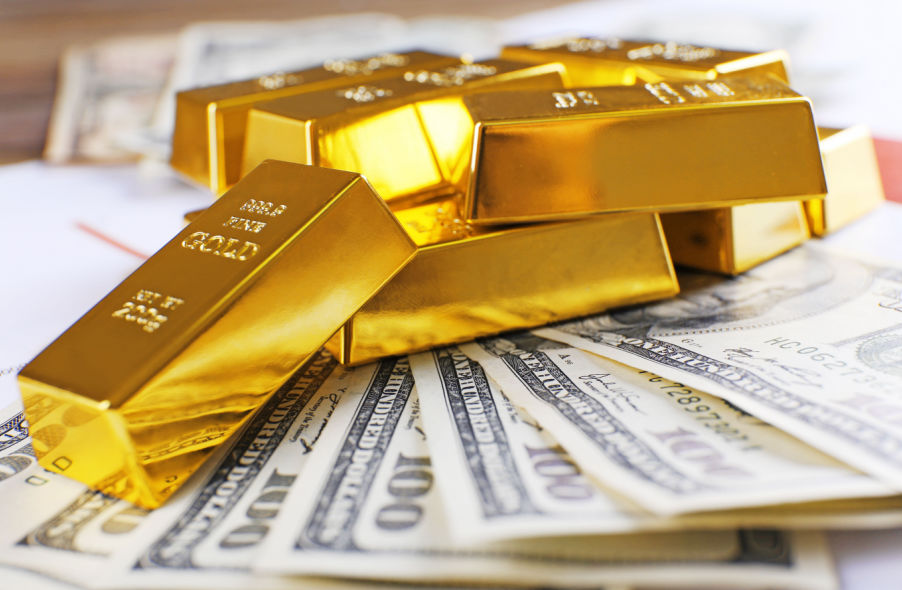 gold bars with 100 dollar banknotes