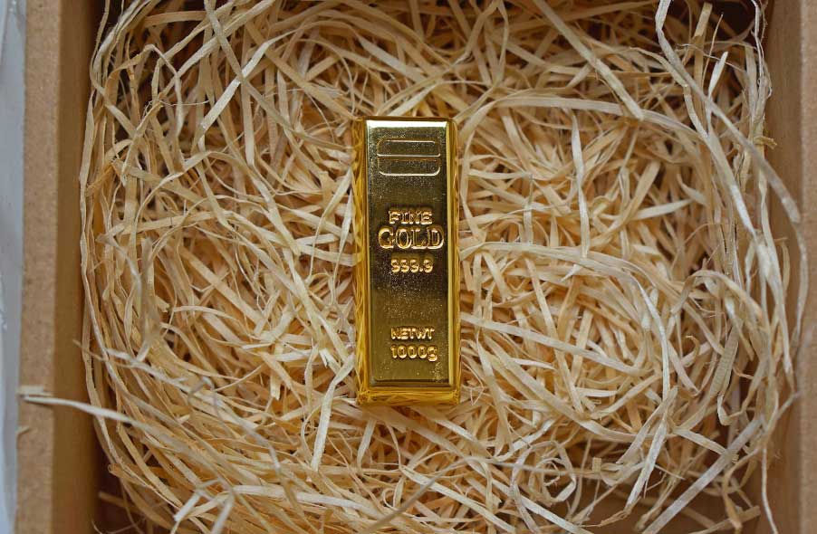 one kilogram fine gold bar on nest