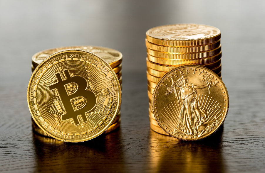 stack of gold coins and coin with bitcoin icon