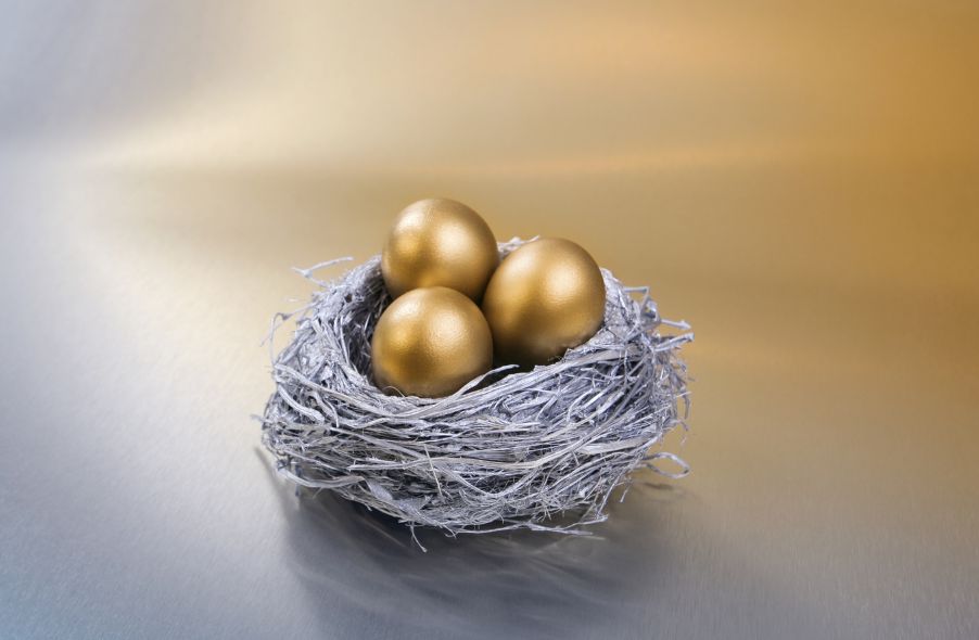 silver nest with three gold eggs