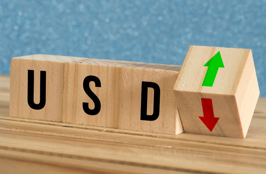 usd and arrow up and down on wooden cubes
