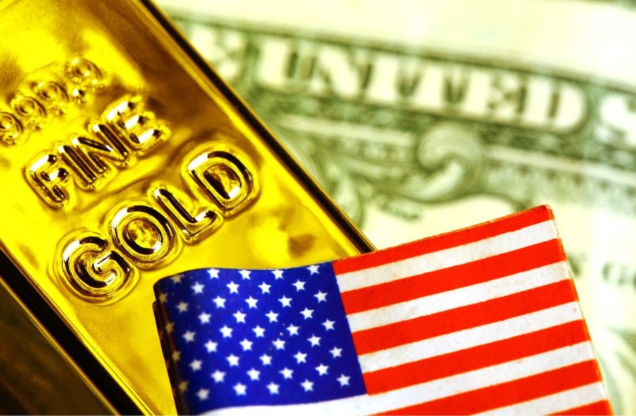united states flag and dollar with gold bar